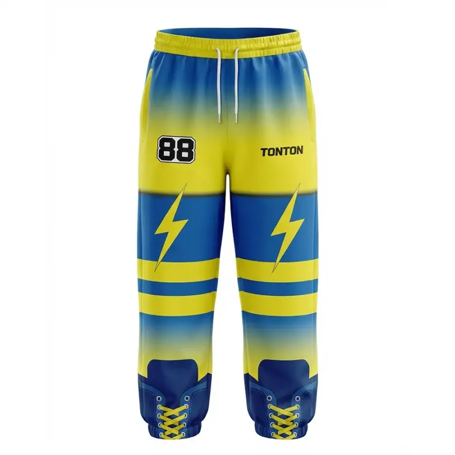 TONTON-Hockey-Jogger in Königsblau und Gelb mit Blitzsymbol – dynamische, individuelle Team-Spirit-Bekleidung