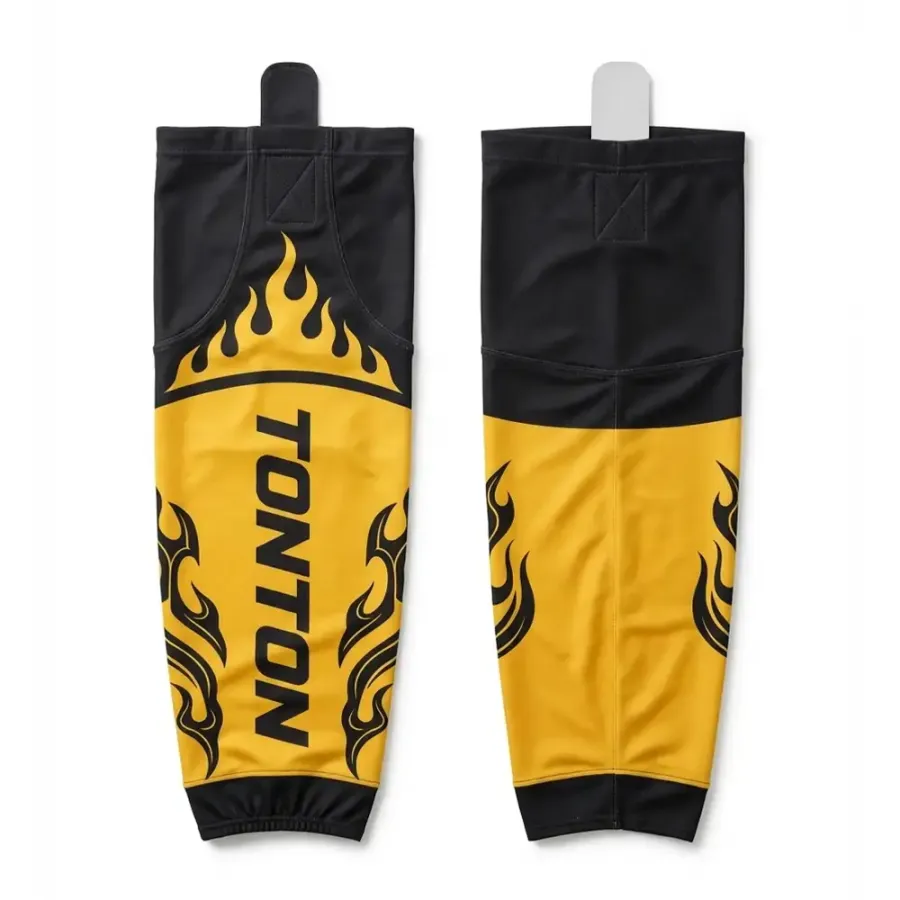 TONTON Bold Schwarz-Gelb-Flammen-Motiv-Hockeysocken – dynamische sublimierte Leistungssocken