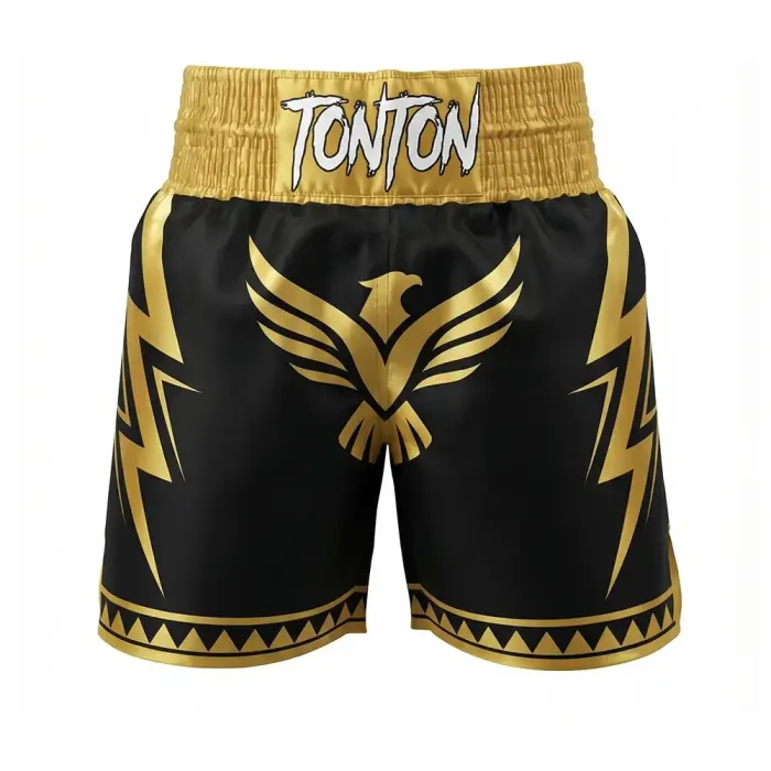 tonton black custom boxing shorts front view with gold eagle logo and lightning bolts fightwear