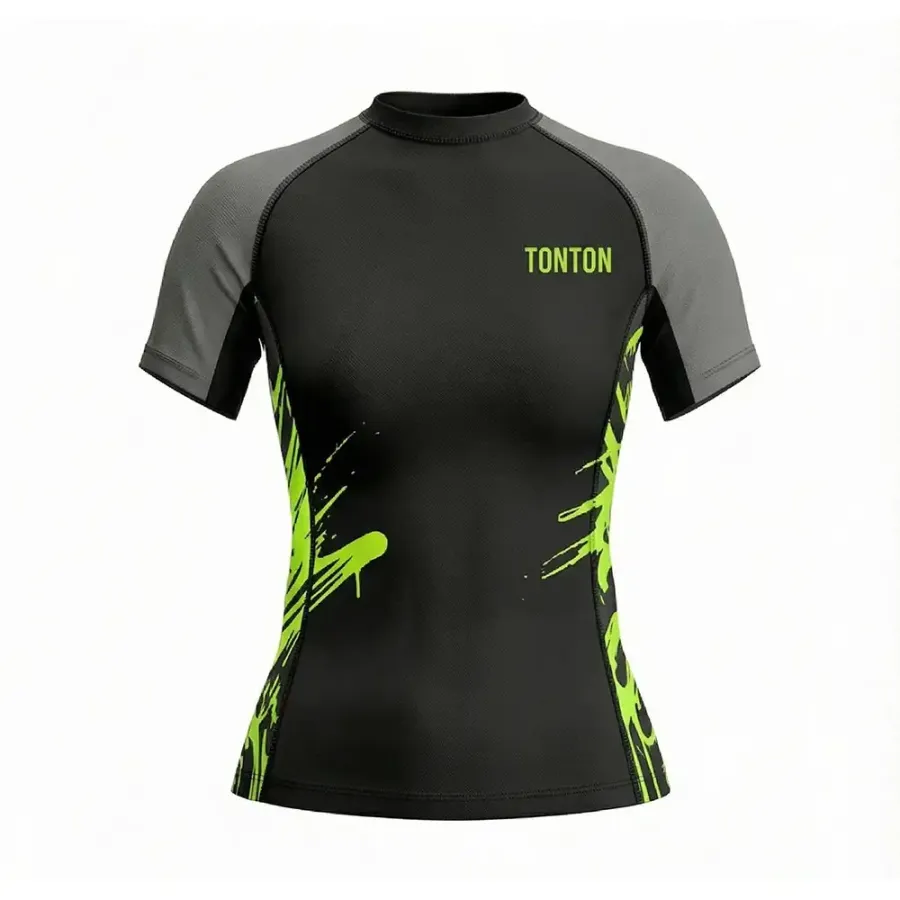 Tonton – Top de protecție anti-arderi pentru antrenamente (Rash Guard) pentru femei, în variantă Black & Neon Green Splatter – Mat Burn Shield, cu efect de compresie