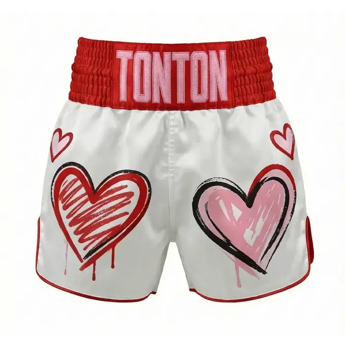 tonton white custom Muay Thai shorts front view with red graffiti heart graphics fightwear