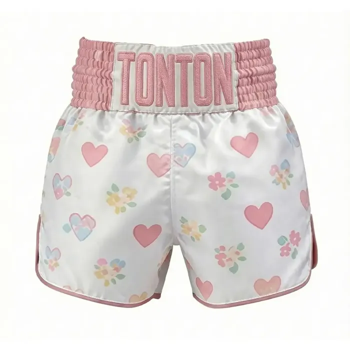 tonton white custom Muay Thai shorts front view with small pastel hearts fightwear