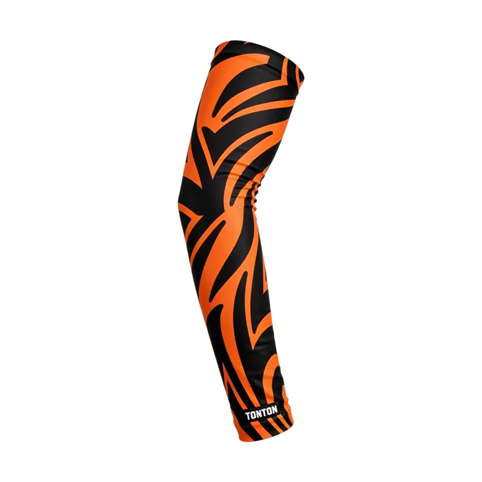 tonton custom volleyball compression arm sleeve featuring a vibrant orange and black tiger stripe pattern with a professional logo.