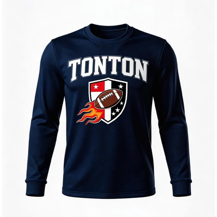 Front view of tonton navy blue long-sleeve football base layer with a central shield crest and flaming football illustration.