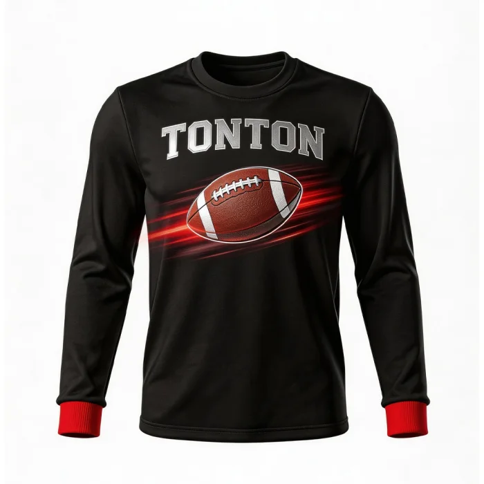 Front view of tonton black long-sleeve base layer with red cuffs and a dynamic speeding football graphic with branding.