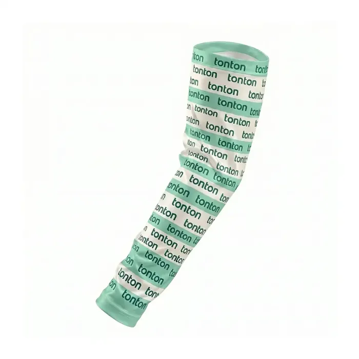 tonton professional arm sleeve featuring an all-over repeating tonton logo pattern on a light mint green and white background.