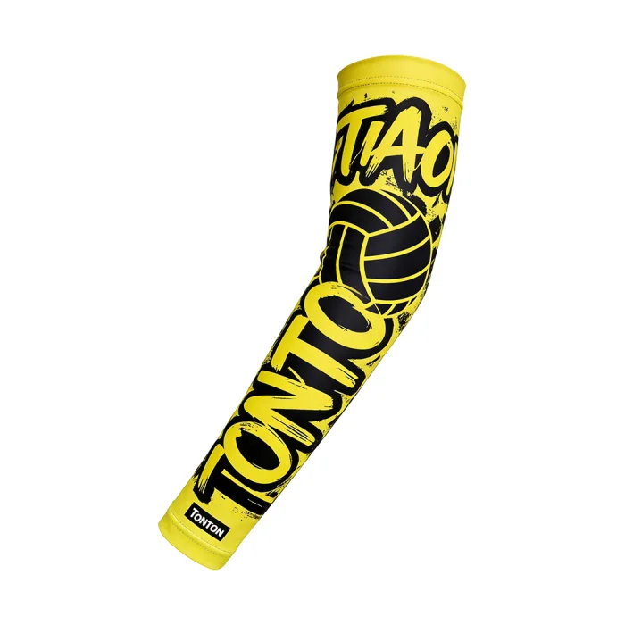 tonton athletic arm sleeve in vibrant yellow featuring bold black graffiti-style tonton branding and a central volleyball graphic.