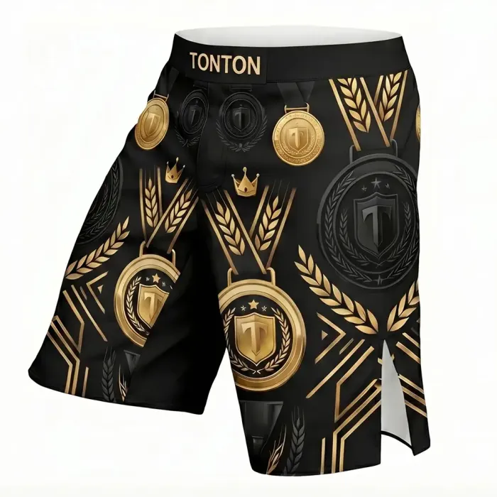 tonton black custom MMA shorts left view with gold luxury crowns and shield crests