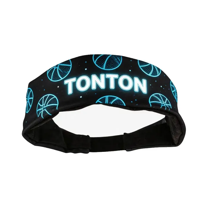 tonton black basketball headband showcasing a galaxy-style pattern with light blue basketball outlines and a sparkling brand logo.